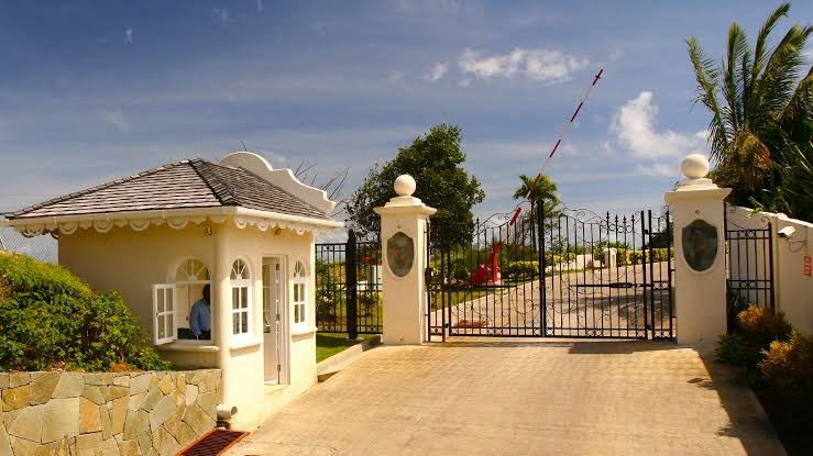 Gatehouse and entrance gates to a private residential estate in northern St. Lucia