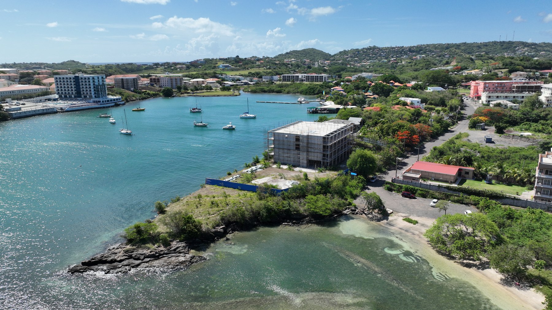 Drone view of True Blue Bay marina, moored yachts and the One True Blue site