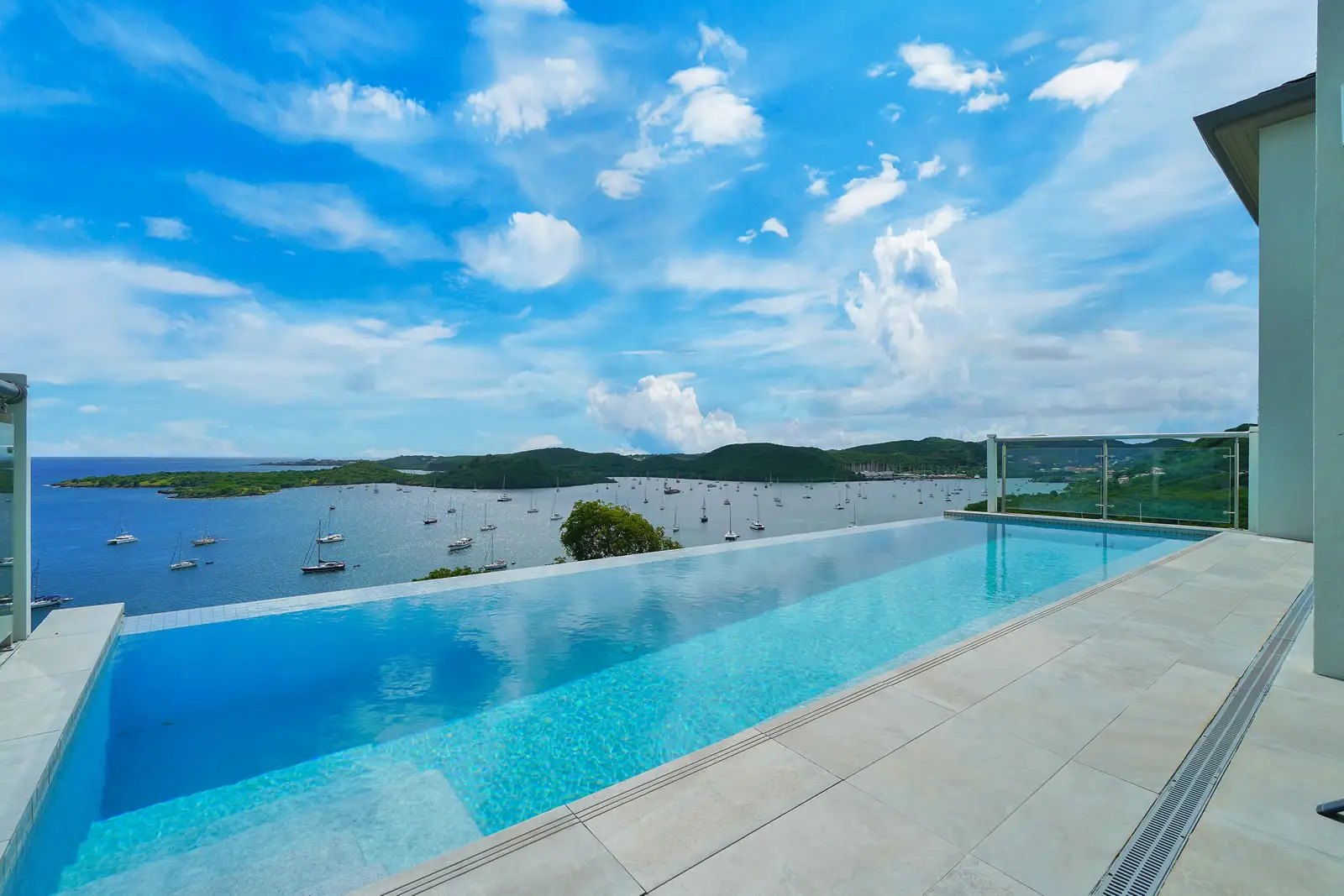 Infinity pool at The Point at Petite Calivigny overlooking moored yachts in Grenada's southern anchorage