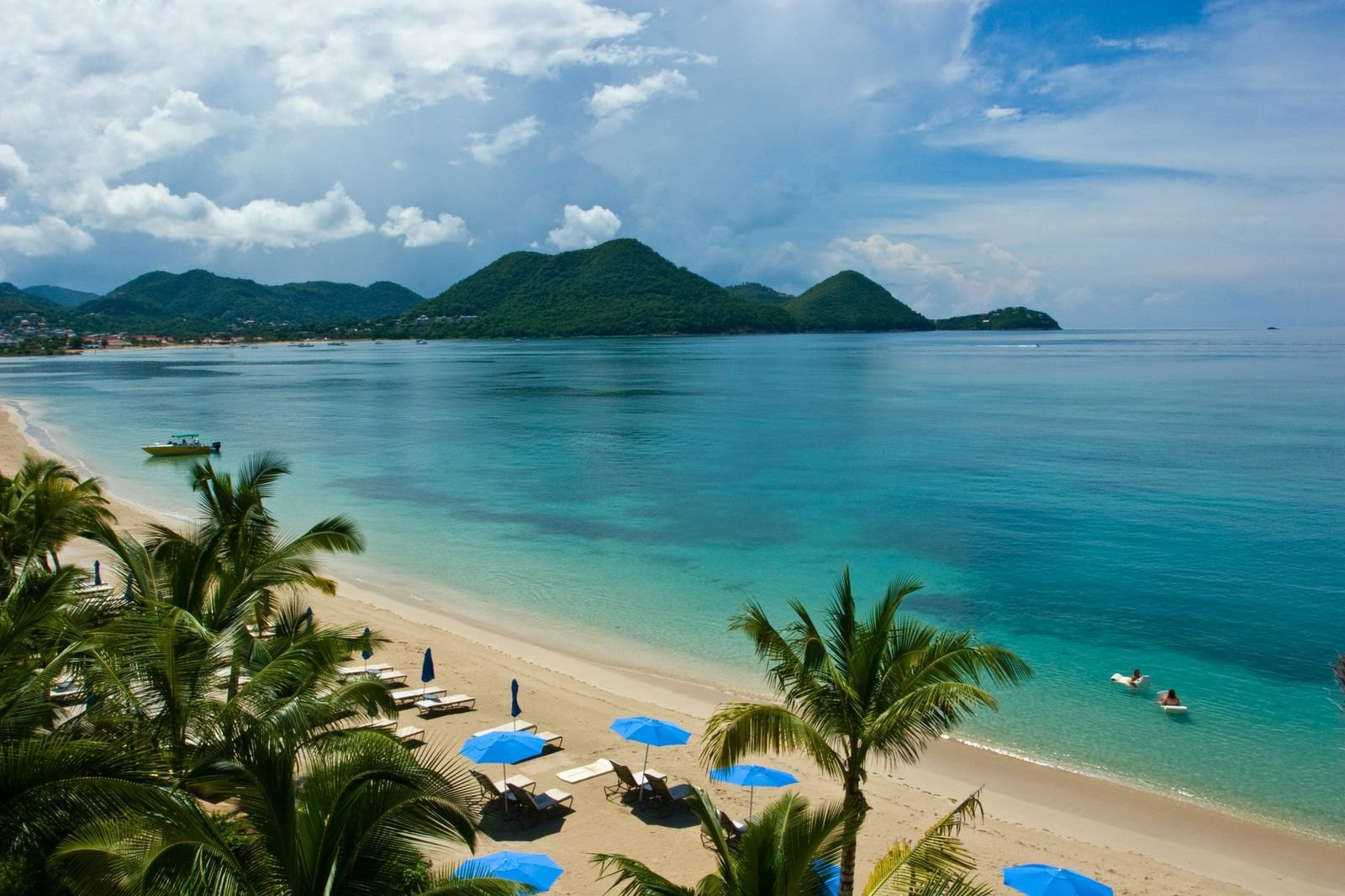 Turquoise water and pale sand of Rodney Bay seen from The Landings, St. Lucia