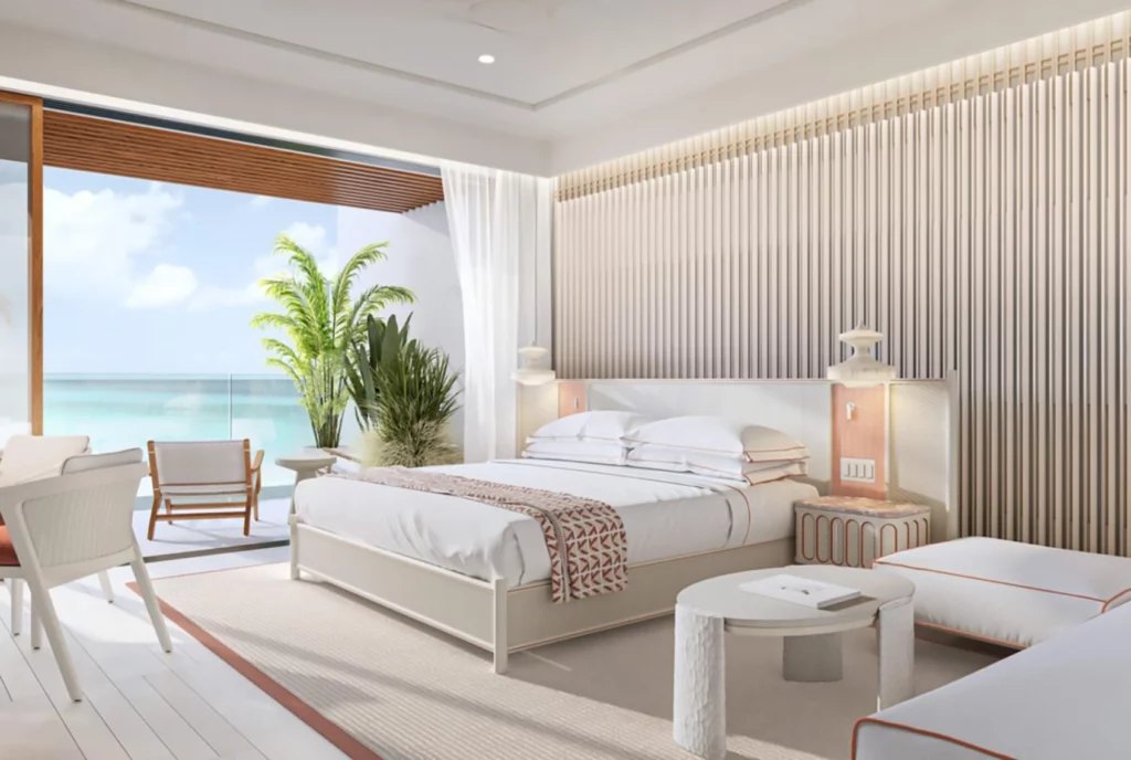 Artist's rendering of a Setai Sint Maarten bedroom suite opening to a sea-view terrace