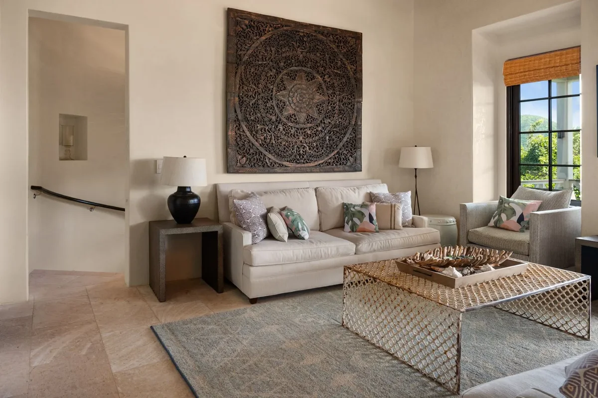 The living room with a coffered ceiling