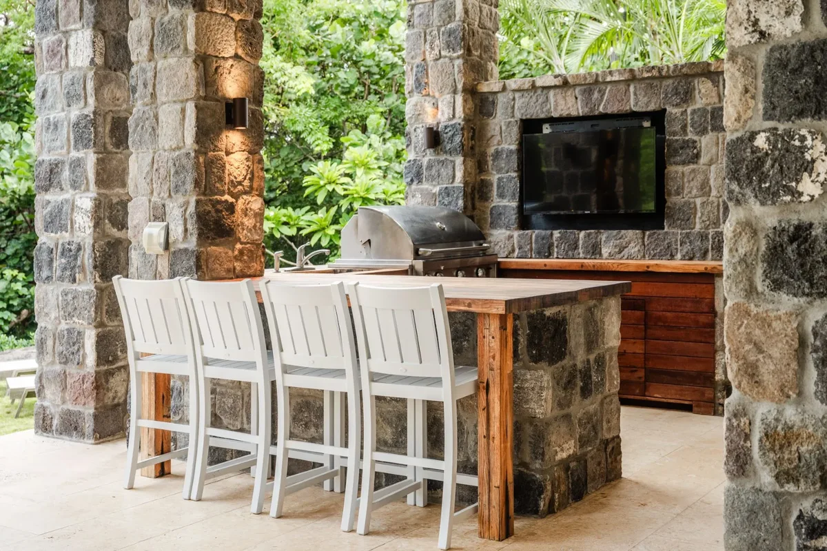 The outdoor kitchen and grill