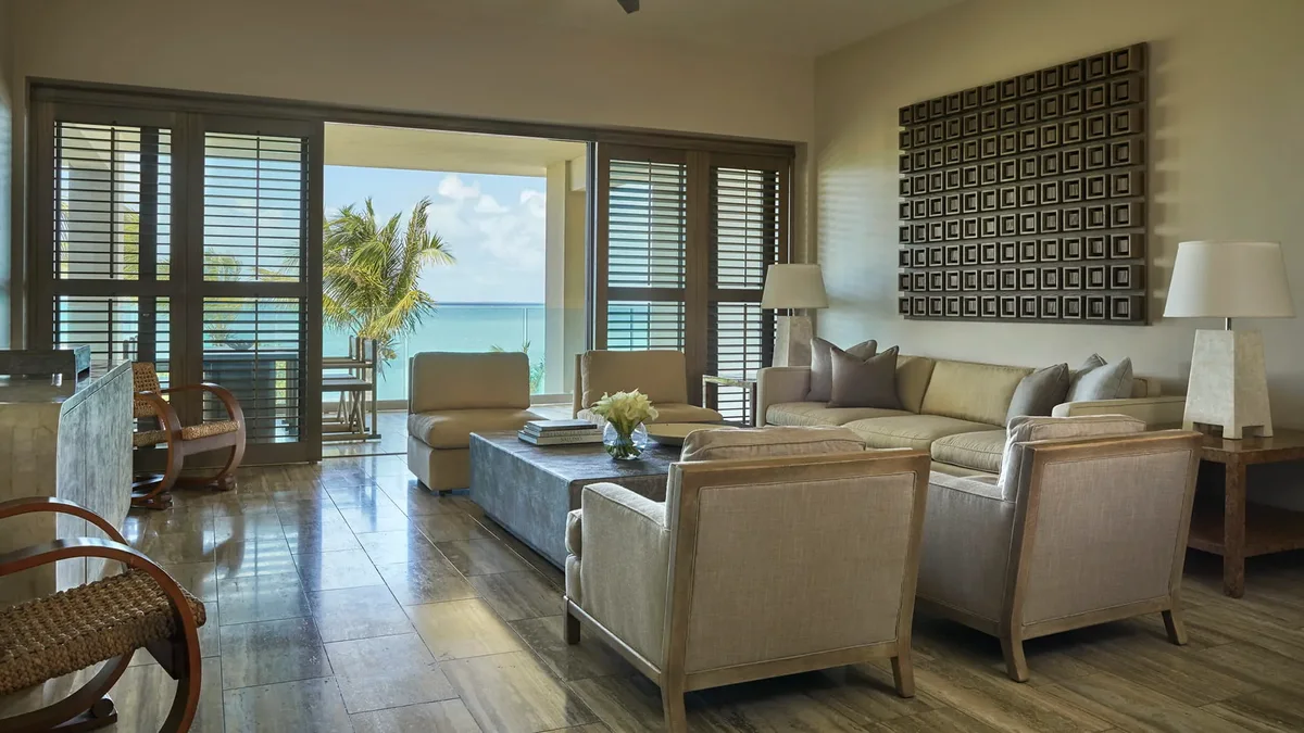 The living room opening to the beach