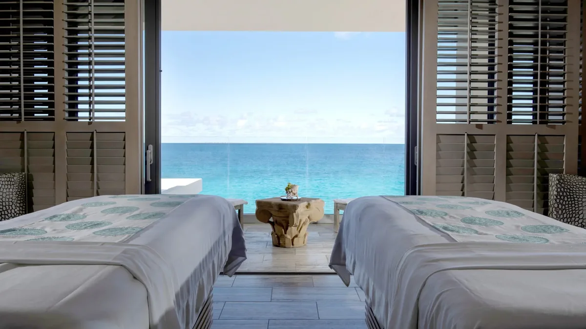 Twin beds facing the water