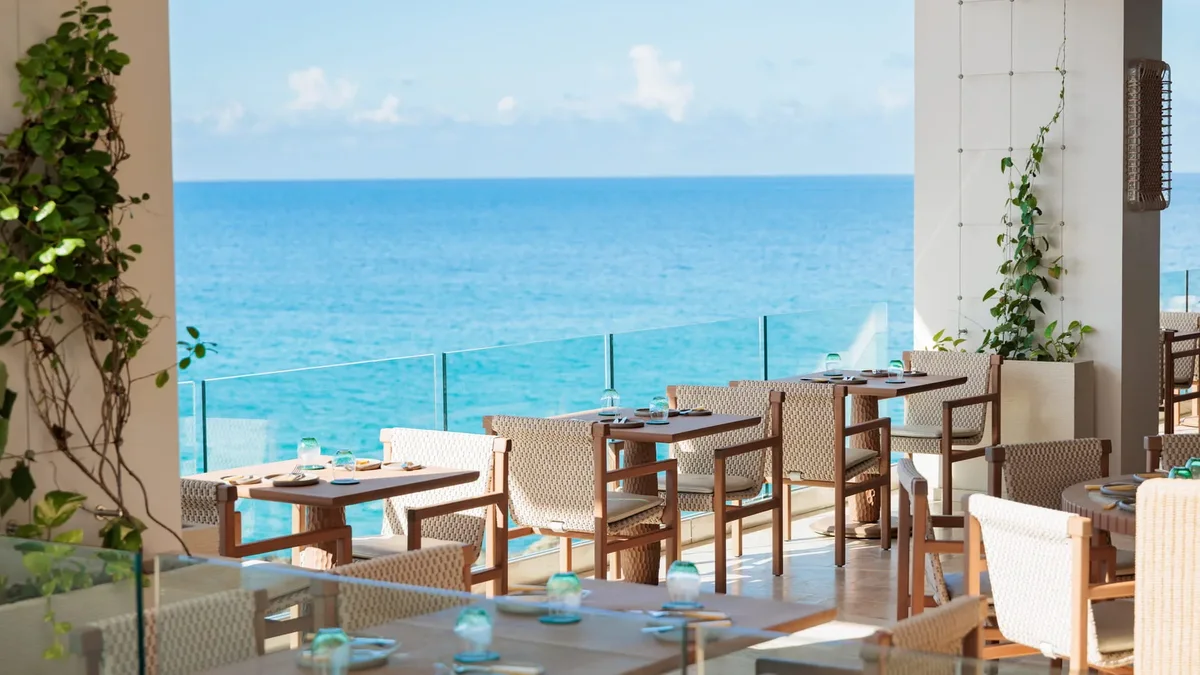 The dining room open to the water