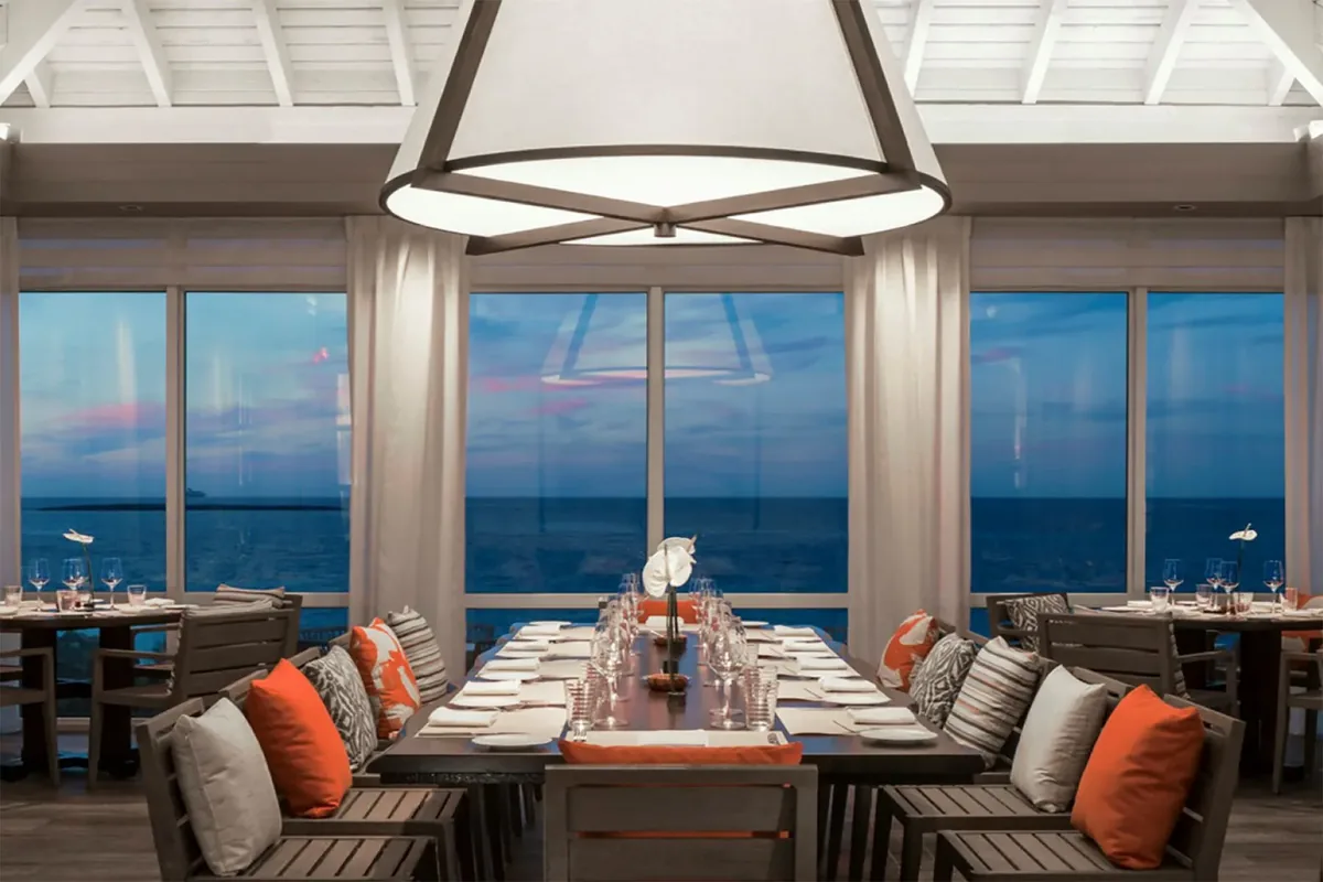 Artist’s rendering of the oceanfront restaurant, laid for dinner