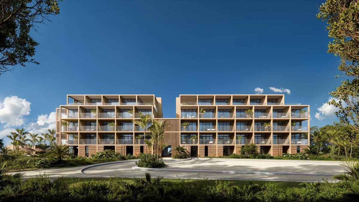 Artist’s rendering of arrival/entrance elevation from the driveway — full symmetrical facade against deep blue sky. 2560x1440