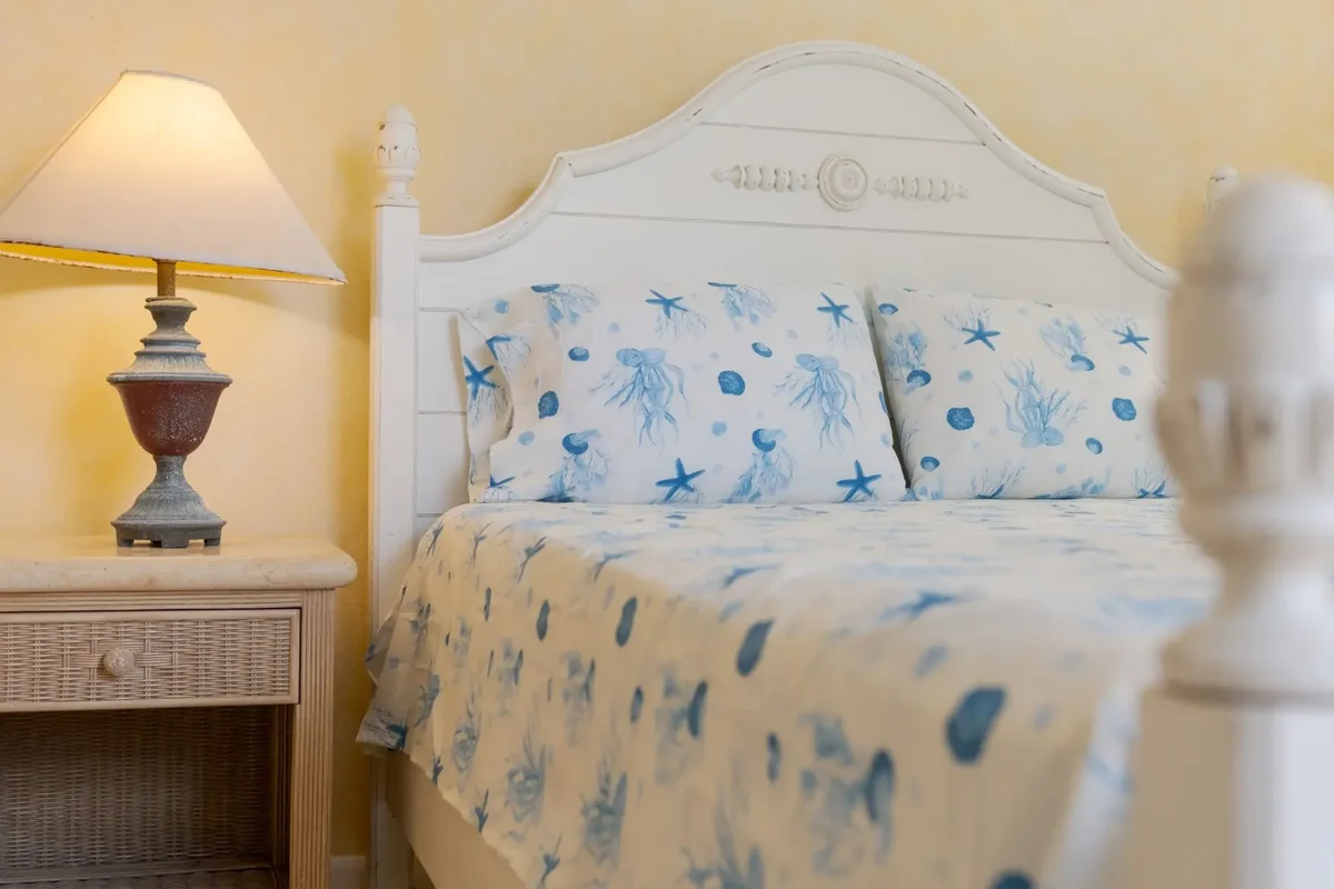 A bedroom in blue and white