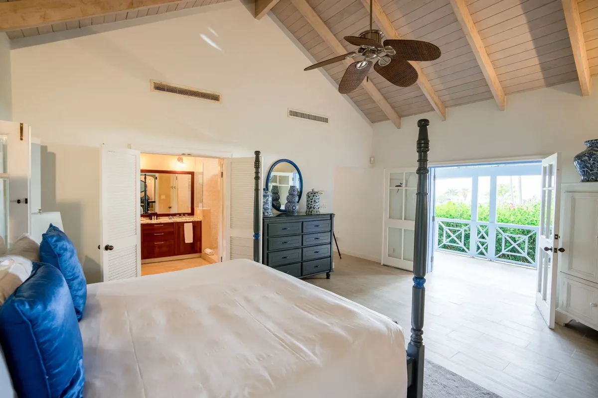 A bedroom opening to the verandah