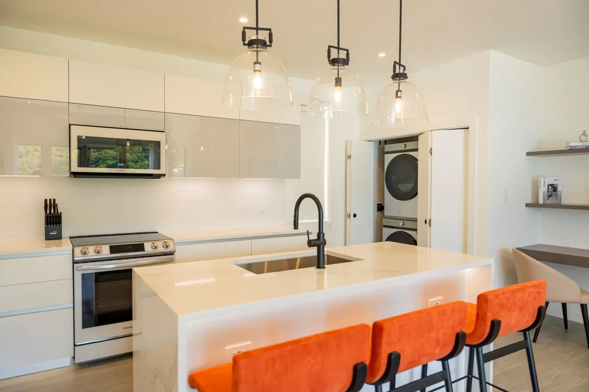 The kitchen island and breakfast stools