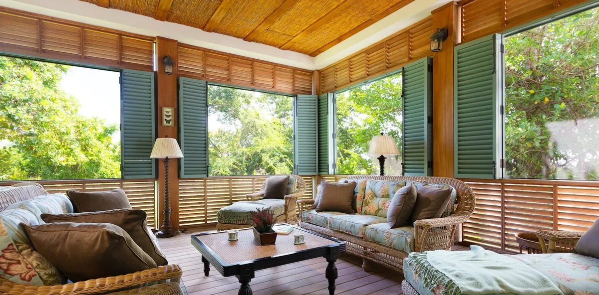 A garden room in green and timber
