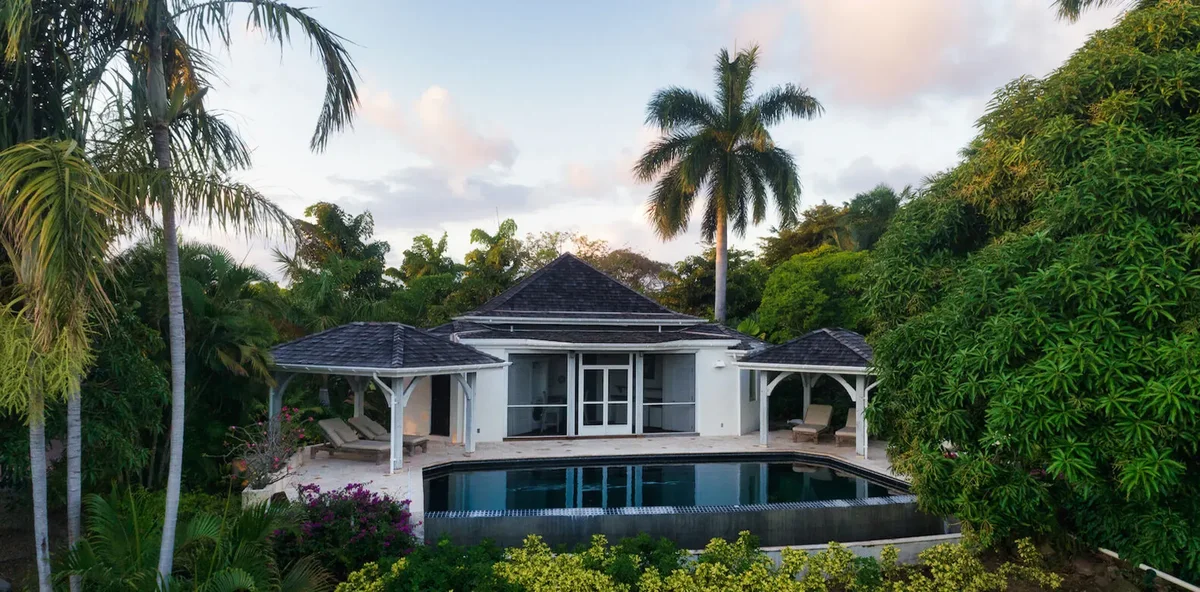 The villa above its pool terrace