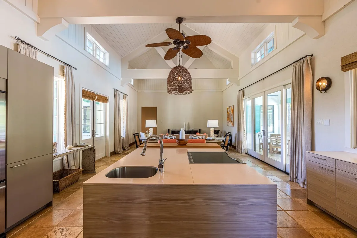 The kitchen island under a vaulted ceiling