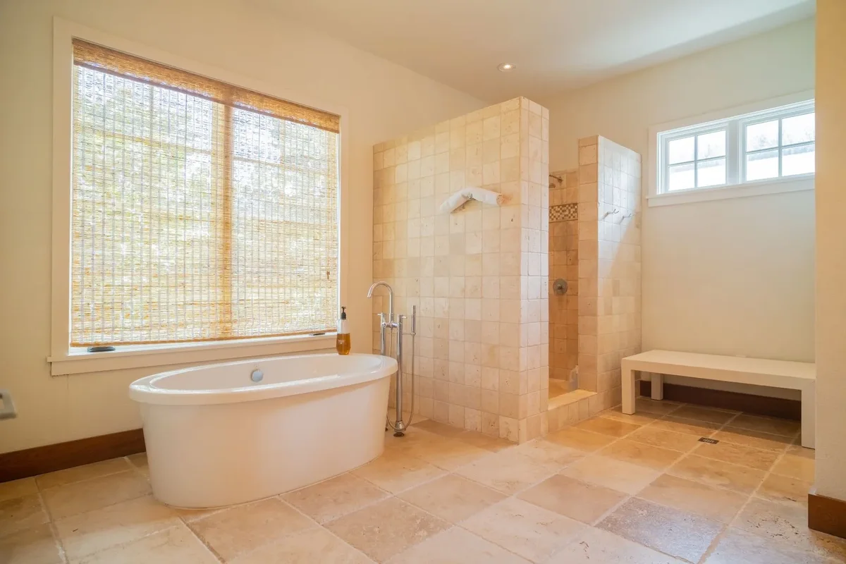 A bathroom with a freestanding tub