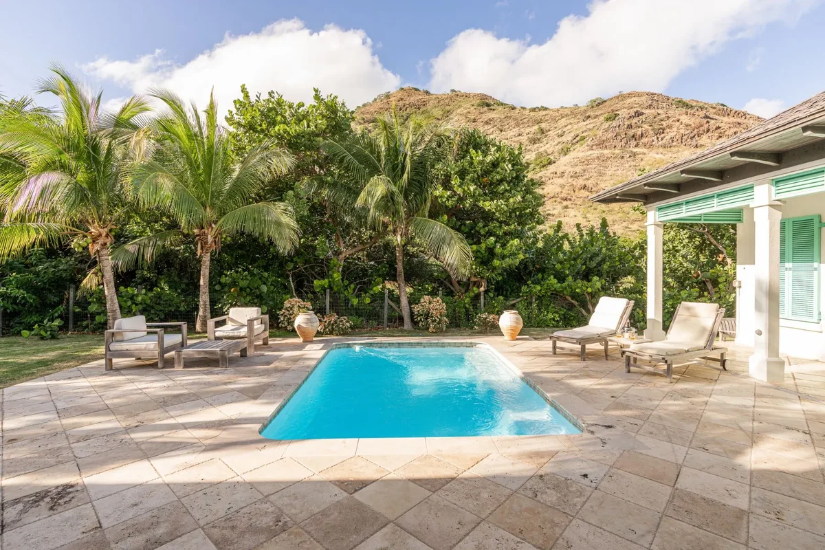The pool and terrace with the hills behind